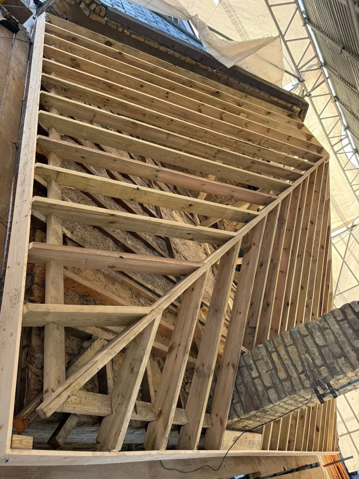 New roof timbers and rafters during a re-roof in Helston