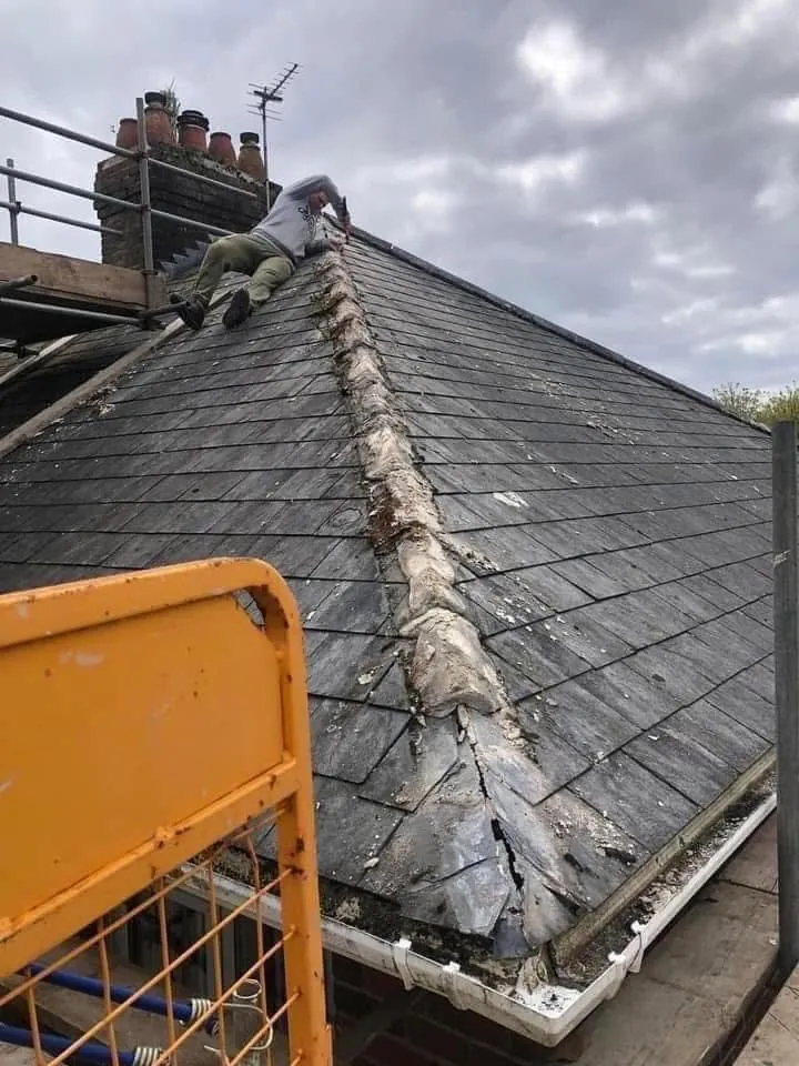 Slate roof ridge and chimney repair in Helston